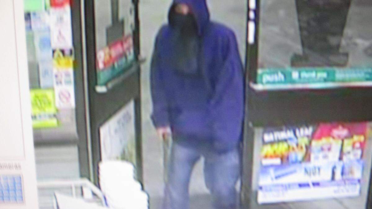 A photo of an armed man in an attempted robbery at a 7-Eleven, according to the Manatee County Sheriff's Office.PHOTO PROVIDED