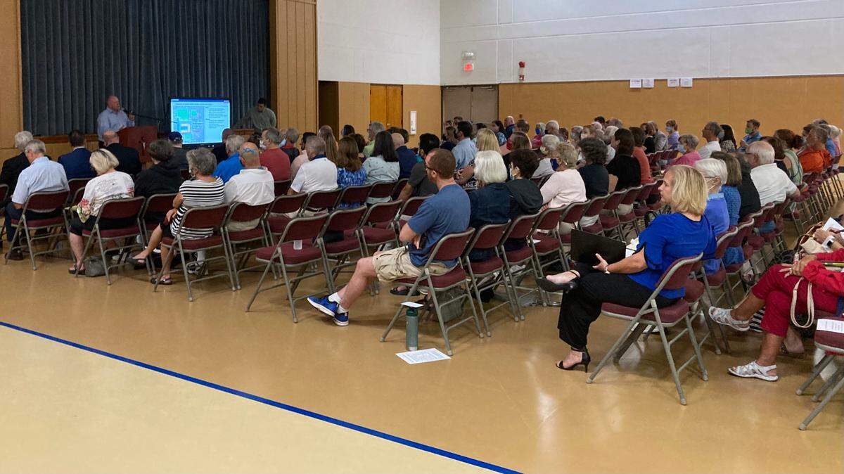 9/1/2021--With a show of hands, a crowd of several hundred strongly opposed building a 96-unit affordable housing complex adjacent to&nbsp;St.&nbsp;Joseph Catholic School.
