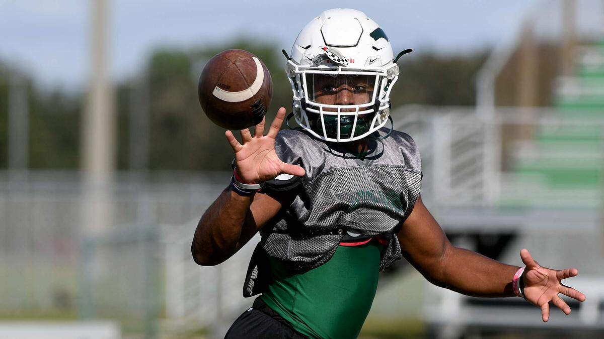 Kevin Everhart trains at Lakewood Ranch High football practice at the stadium field Monday afternoon.