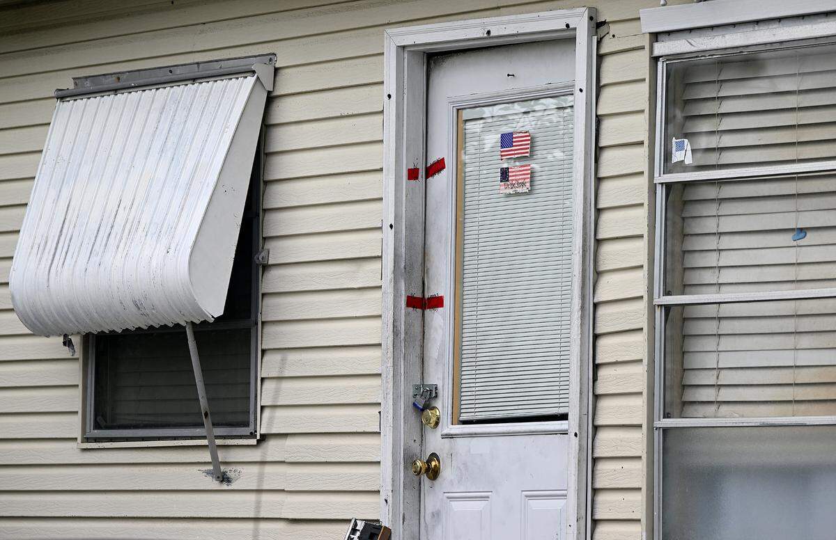 Evidence tape is pasted upon one of the doors at the home where Patricia Matejcek and Sean Harrison, Sr. were found dead in the Arbor Terrace RV Park in Bradenton on Friday, Nov. 10. Thomas Matejcek, Patricia’s son, is facing two counts of second-degree murder in the double-homicide case.