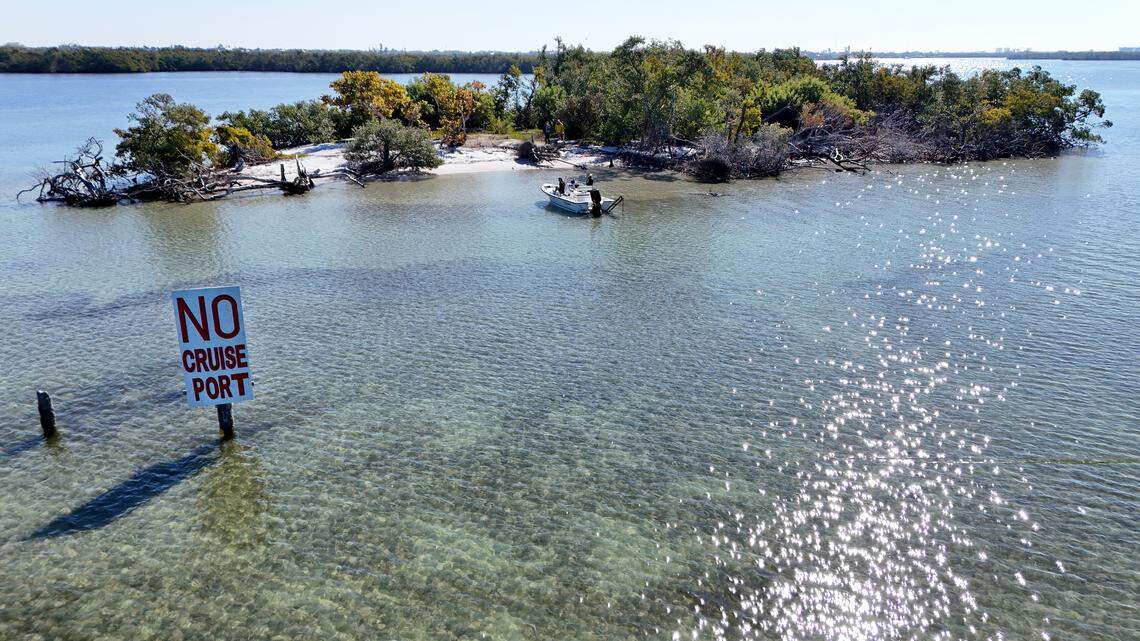 A sign that reads “No cruise port” stands offshore Paradise Island, near where Tampa Bay meets the Terra Ceia Aquatic Preserve. The island lies within sight of the Knott-Cowen Tract, a coastal property southeast of the Sunshine Skyway Bridge where two companies propose to build a new cruise port terminal.  
