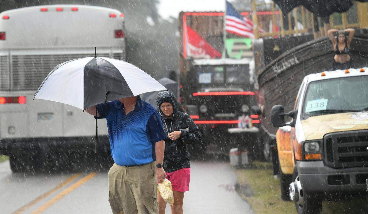 De Soto Parade participants found shelter in the Manatee High cafeteria as a rain band made its way through the area. Parade organizer still plan to have the parade, just delaying the start until 7:45.