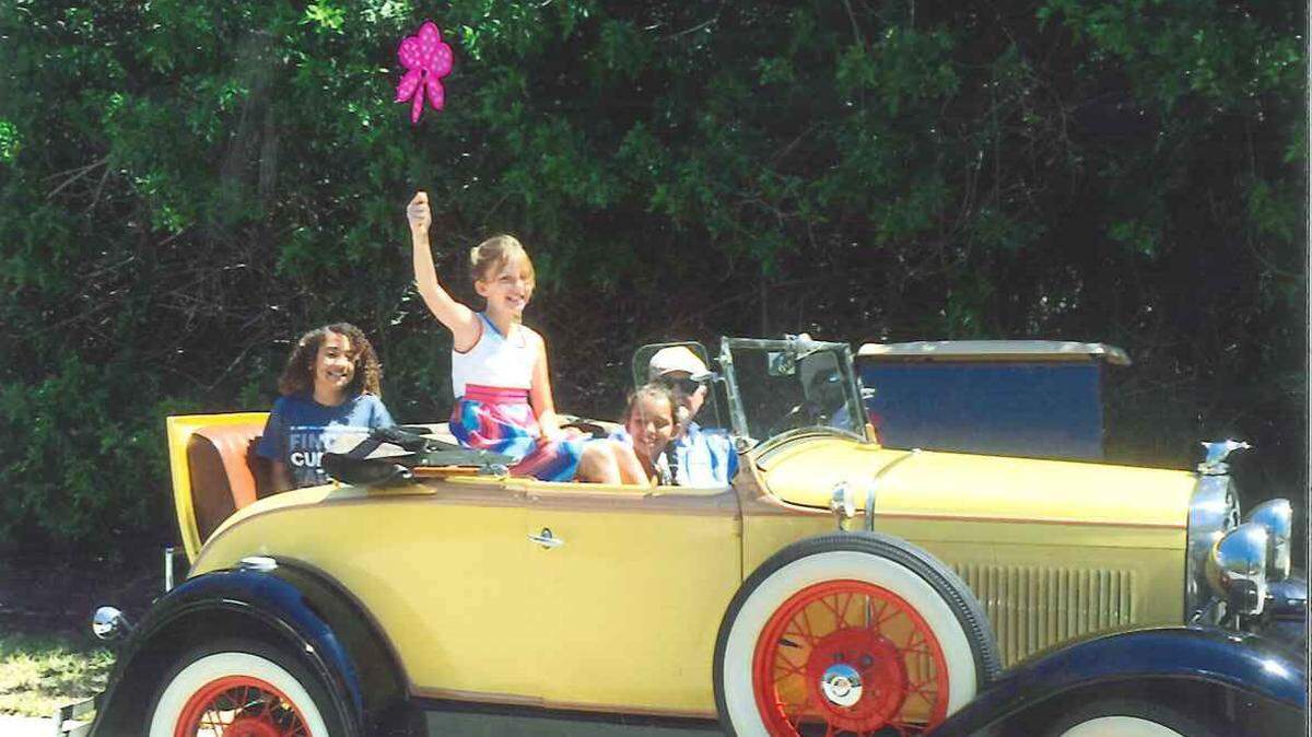 Francesca Friedel, center, raised more than $7.400 during a March 24 fundraiser for St. Jude's Children's Research Hospital.