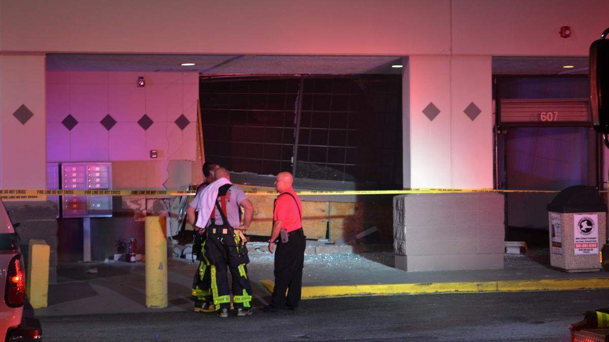 An unidentified driver crashed into the Anytime Fitness at Palmetto Village Shopping Center in Palmetto on Tuesday night.