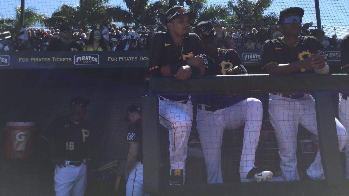 Members of the Pittsburgh Pirates get ready to take the field against the Minnesota Twins on Saturday at Lecom Park as the 2020 MLB spring training games began this weekend across the country.