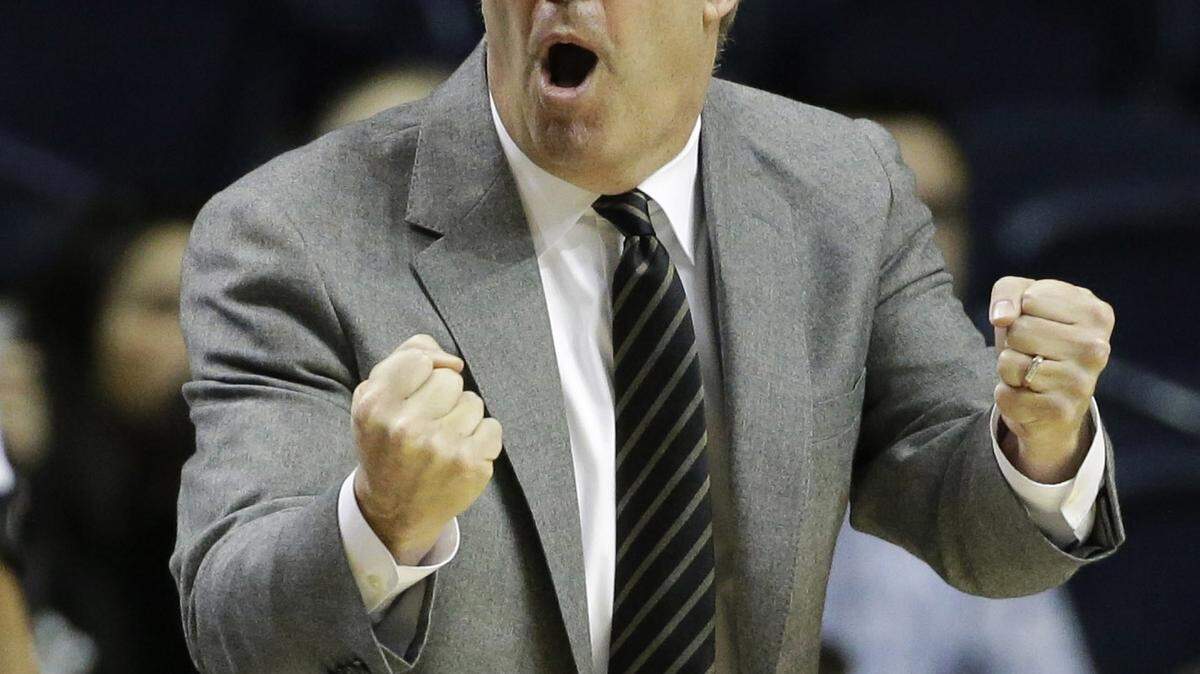 FILE - In this March 12, 2015, file photo, Vanderbilt head coach Kevin Stallings gestures during the first half of an NCAA college basketball game in the second round of the Southeastern Conference tournament against Tennessee, in Nashville, Tenn. This weekendís Big 12/SEC Challenge offers a midseason opportunity for both leagues: The Southeastern Conference has a chance to improve its national perception while the Big 12 seeks to solidify its status as the nationís top basketball conference. ìWeíll see if stepping outside the league and playing some really good teams from a really great league can help us in our standing for pursuit of NCAA Tournament berths,î Vanderbilt coach Kevin Stallings said. (AP Photo/Mark Humphrey, File)