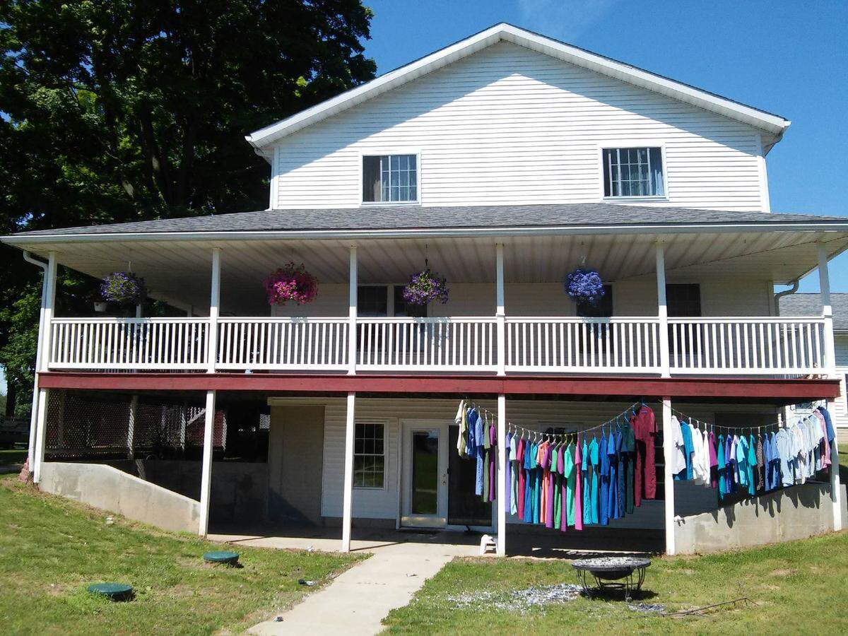 A rainy spring has made it hard to find a day to do the wash, so the Eichers take advantage of a sunny day to hang the laundry out to dry.
