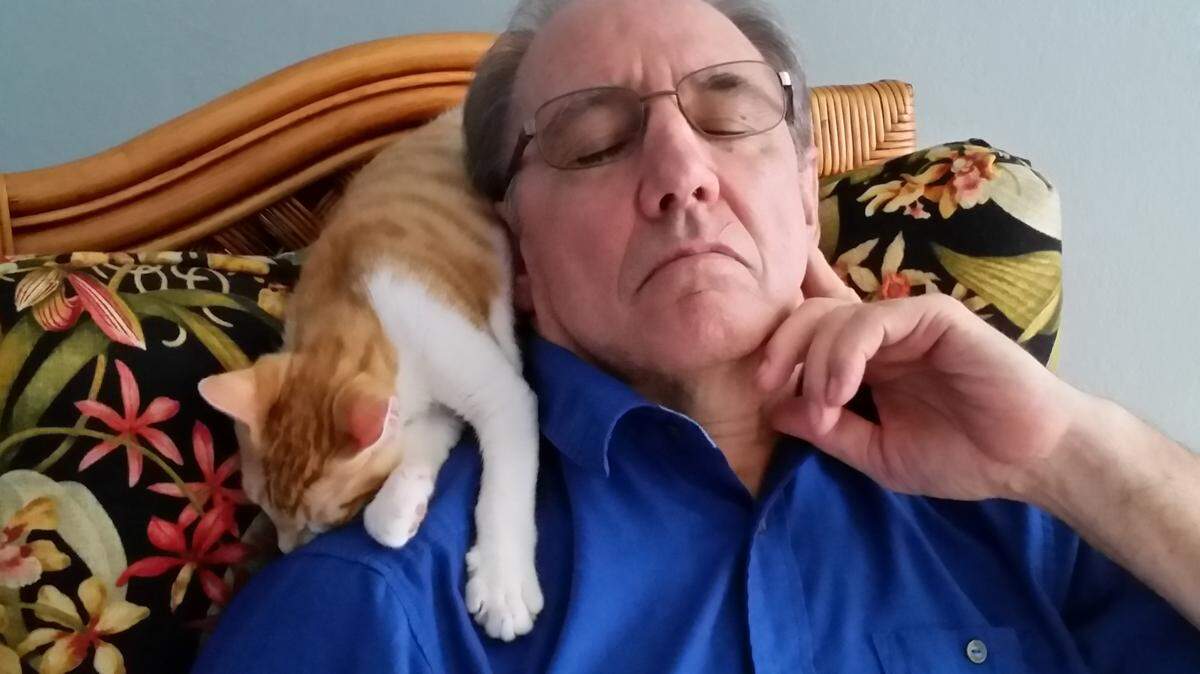 Frankie sleeps on Bob Smith's shoulder shortly after Bob and Jane Smith adopted the kitten from Last Chance Animal Sanctuary. Thanks to Jane Smith's story about the adoption, the organization will receive a $50,000 grant from the Petco Foundation. 
 PHOTO PROVIDED