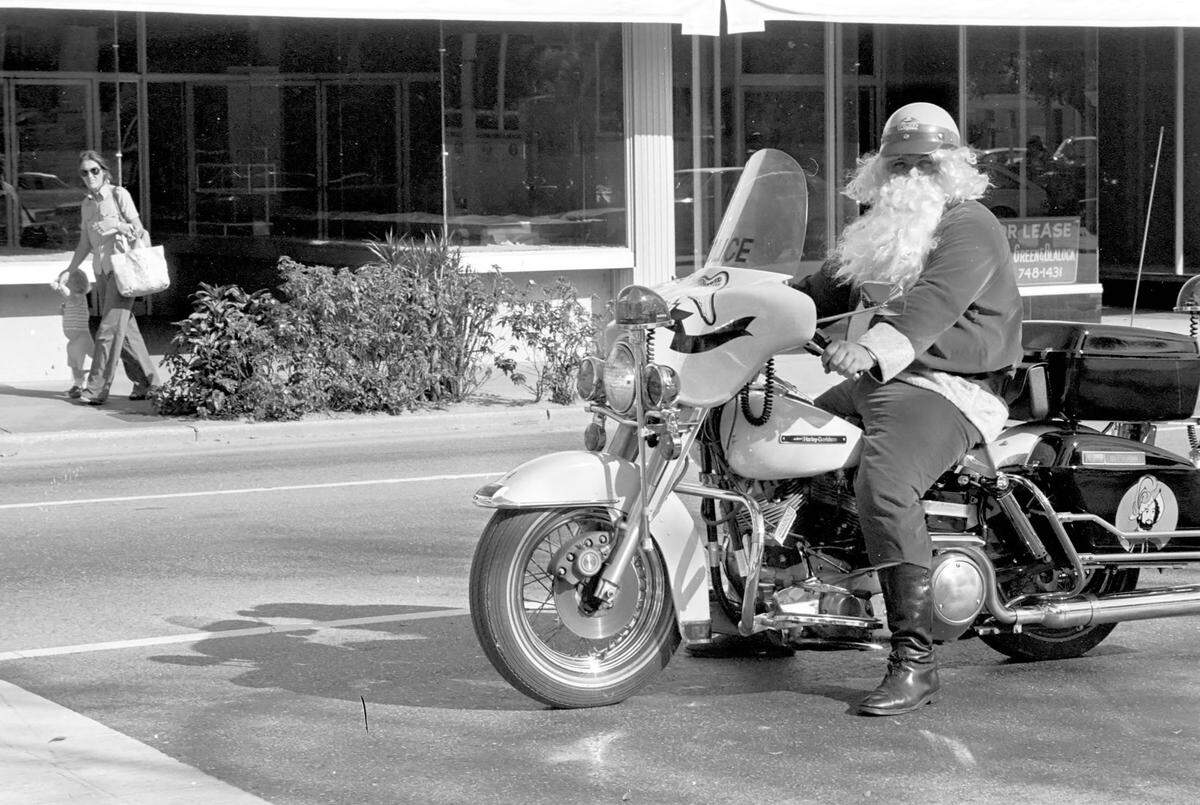 Bradenton police motorcycle officer Mike Mayer as ‘Santa’ in downtown Bradenton, 1979.