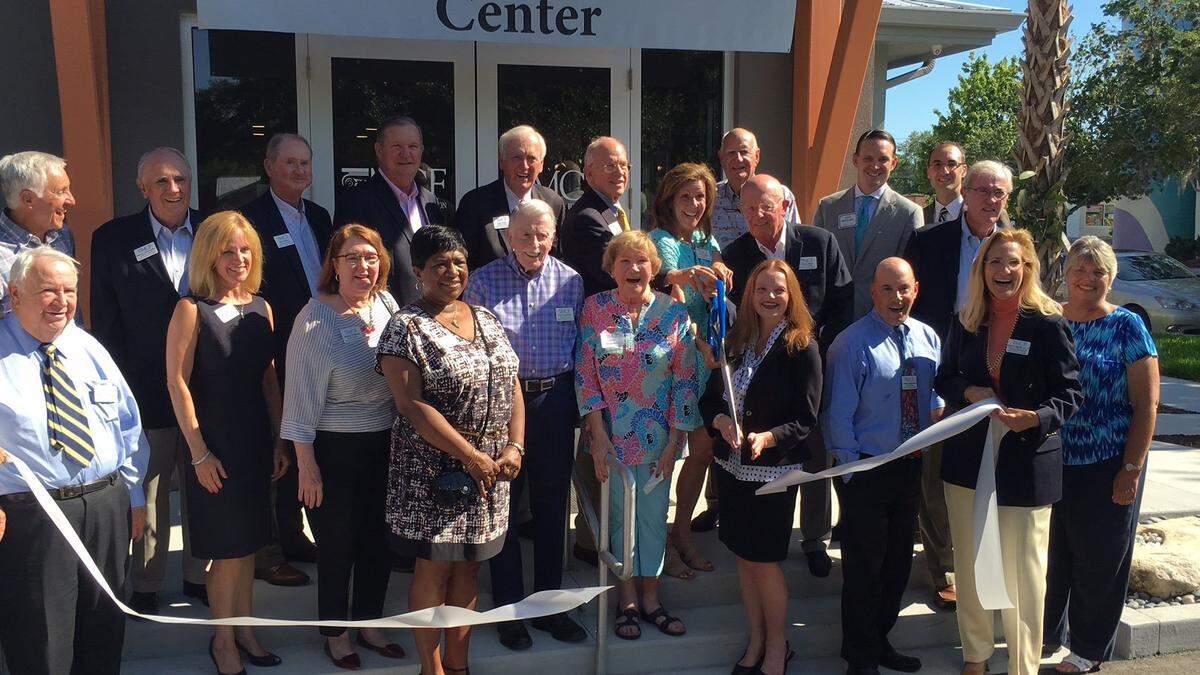 In this 2016 Bradenton Herald file photo, Manatee Community Foundation founders, staff and donors, including Gene and Anne Beckstein, center, cut the ribbon to mark the official opening of the new MCF building at 2820 Manatee Ave. W., Bradenton.