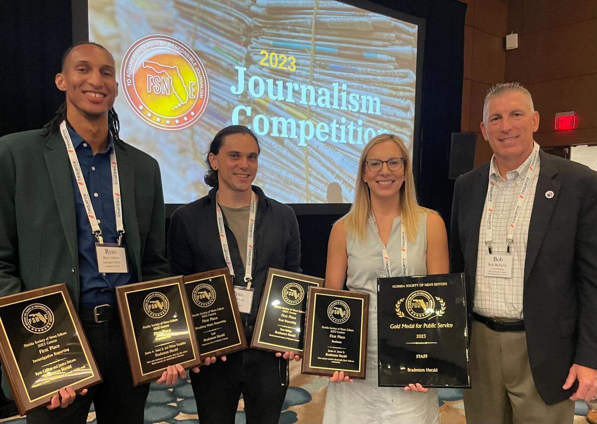 From left, Associate Editor Ryan Callihan, reporter Ryan Ballogg, Executive Editor Lauren Walck and Publisher Bob McFarlin pose with awards to the Bradenton Herald at the 2023 Florida Society of News Editors Journalism Contest luncheon in Sarasota on Thursday, July 21, 2023.
