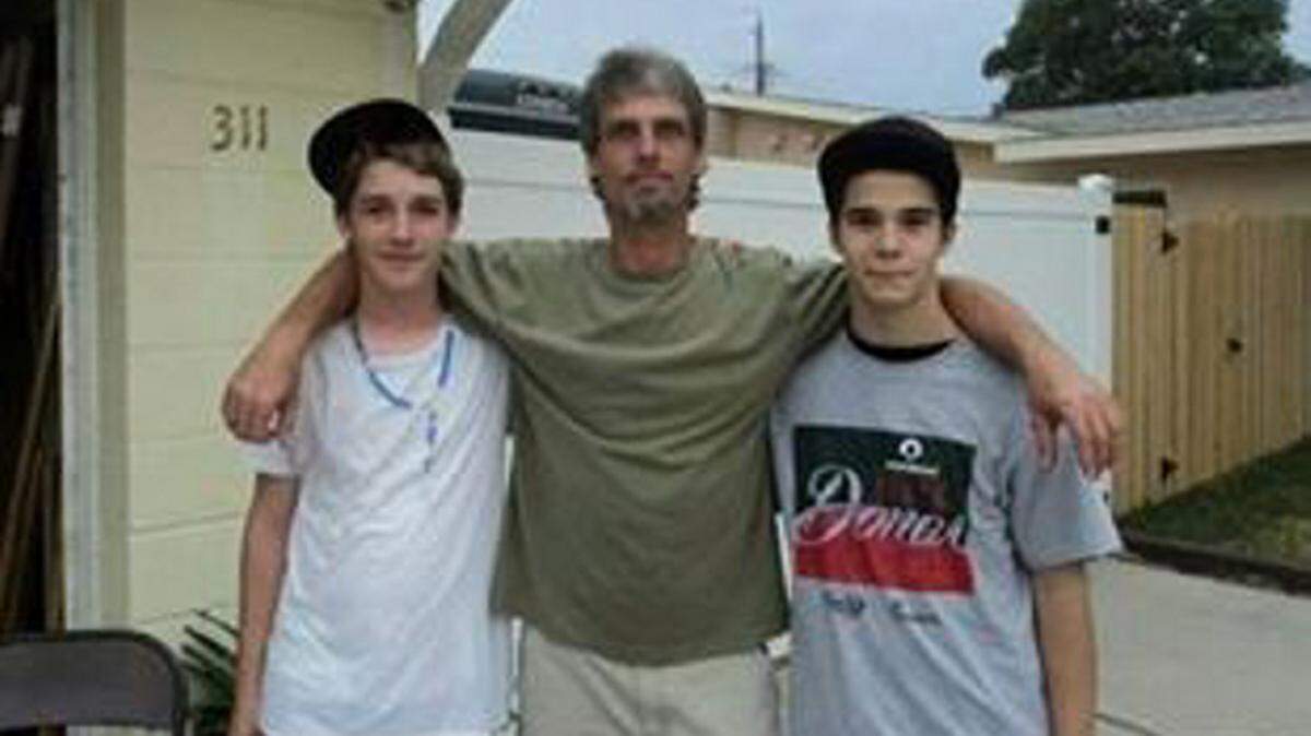 Brian Miller poses for a photo with his two sons. Miller died of a heroin overdose on Dec. 7, 2014. Provided photo