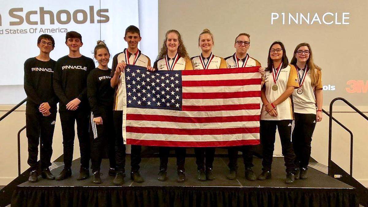 P1NNACLE, a group of Manatee County students, at the national F1 in Schools competition last weekend. Pictured are Sammy Slovak, Hayden Simon, Elizabeth Casadonte, Hunter Raley, Jaye Kendzior, Eleanor Hopkins, Jaxson Bunes, Arianna Longo and Abbygale Owen.