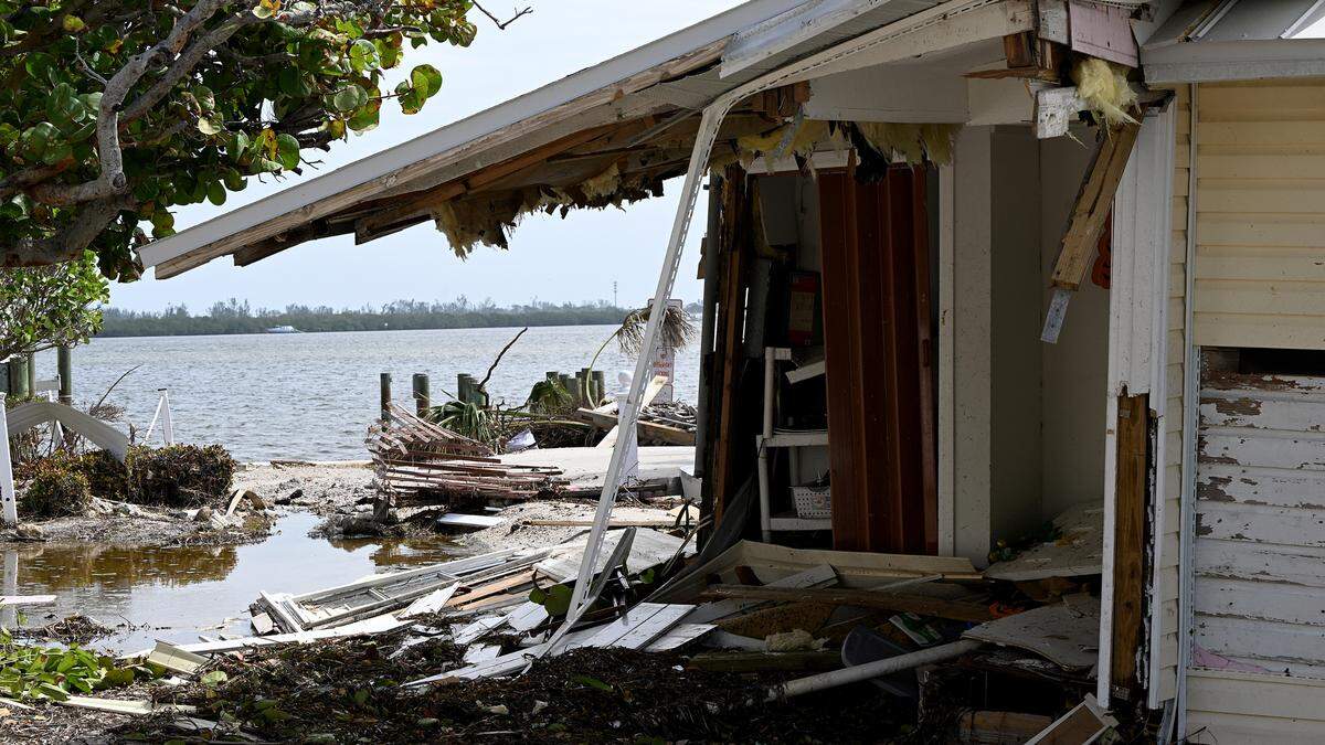 A home on the Intracoastal Waterway sits open to the elements in Bradenton Beach after Hurricane Milton on Anna Maria Island, Oct. 11, 2024.