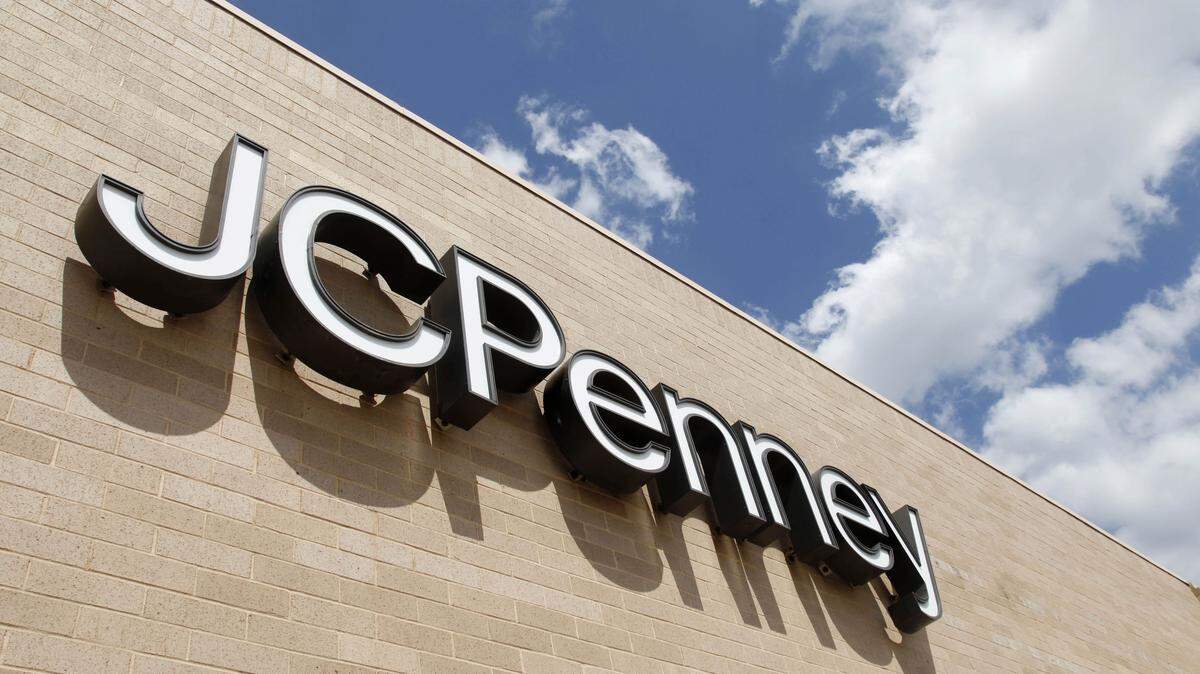 A June 19, 2012 photo shows a sign at a JC Penney store. (AP Photo/Sue Ogrocki)