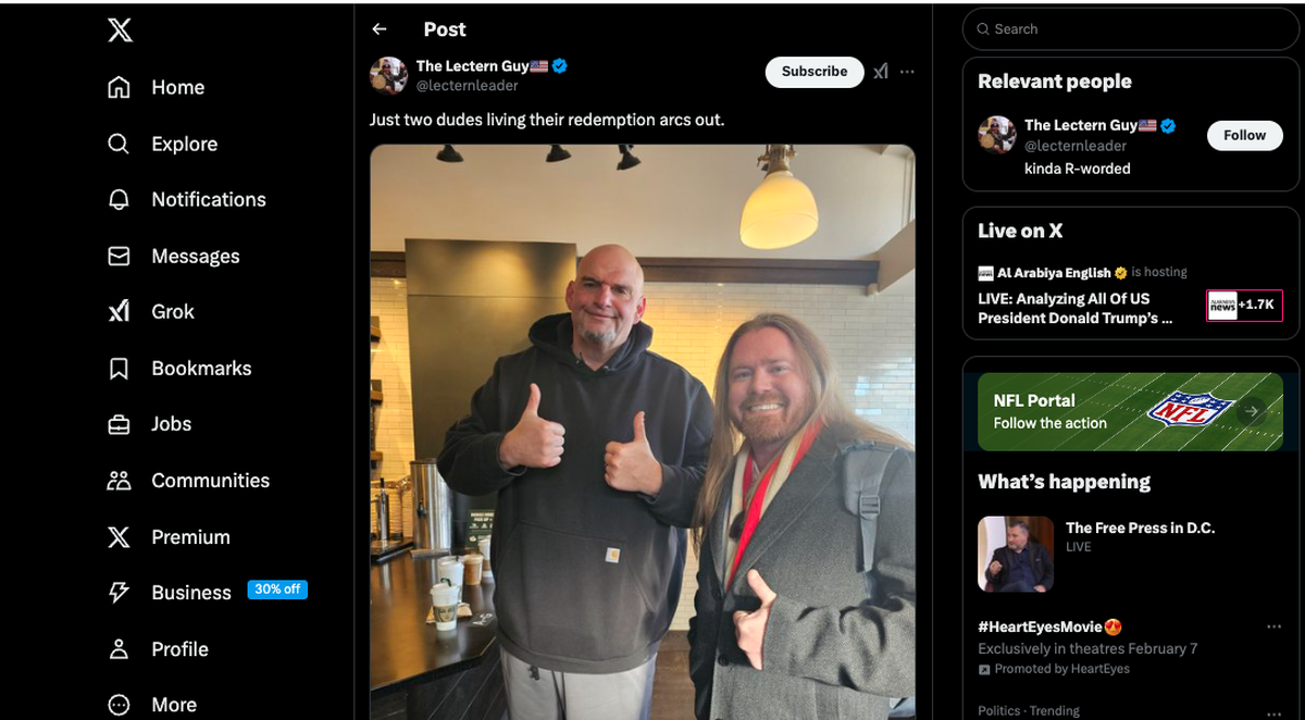 Adam Johnson, famously known as ‘the lectern guy’ for his photo in the Capitol on Jan. 6, posted a photo of himself with John Fetterman on X on Jan. 20, 2025.