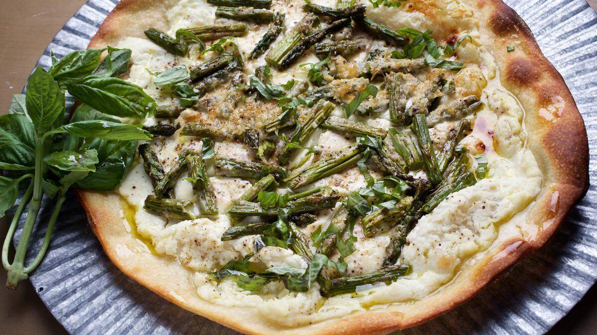 Asparagus and ricotta pizza. THE WASHINGTON POST