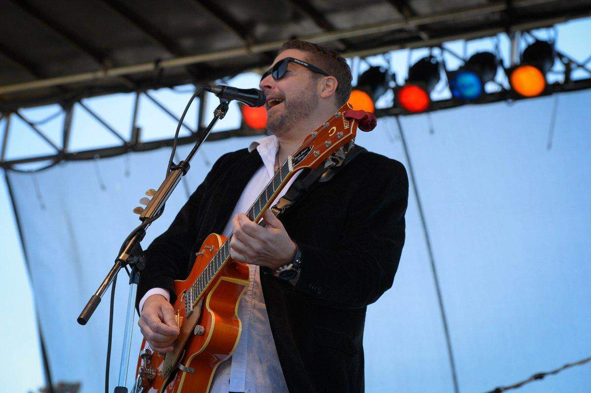 Dana Lawrence, rhythm guitarist and vocalist for Kettle of Fish, which performs Sunday at Stottlemyre’s Smokehouse in Sarasota.