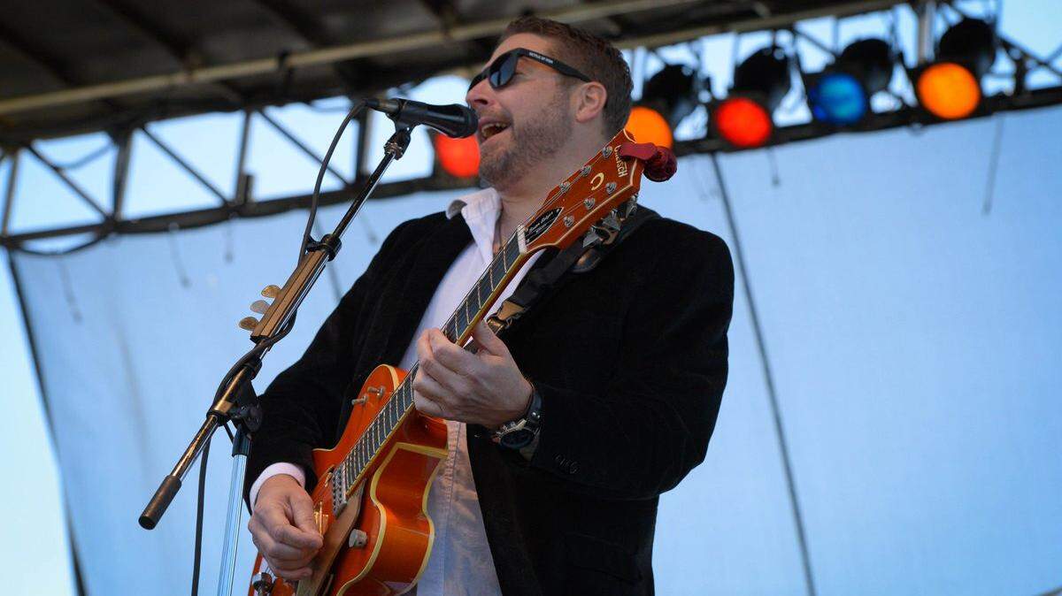 Dana Lawrence, rhythm guitarist and vocalist for Kettle of Fish, which performs Sunday at Stottlemyre’s Smokehouse in Sarasota.