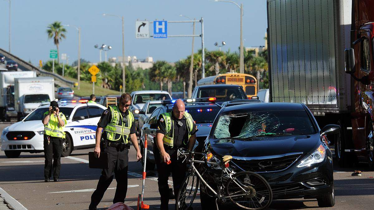 Bradenton Police investigate the scene of a crash involving a bicyclist and a car on First Street near Manatee Avenue. The call came in at 8:30 a.m., and the bicyclist was taken to the trauma center at Blake Hospital. 
 TIFFANY TOMPKINS-CONDIE/Bradenton Herald