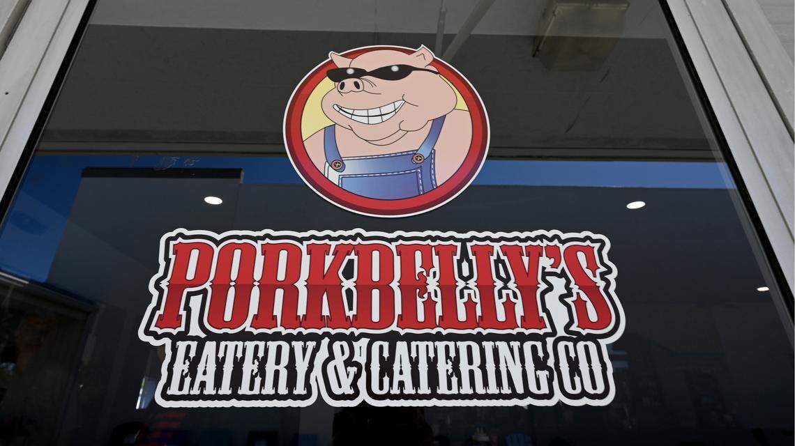 The door sign at Pork Belly’s, 9516 Cortez Road West.