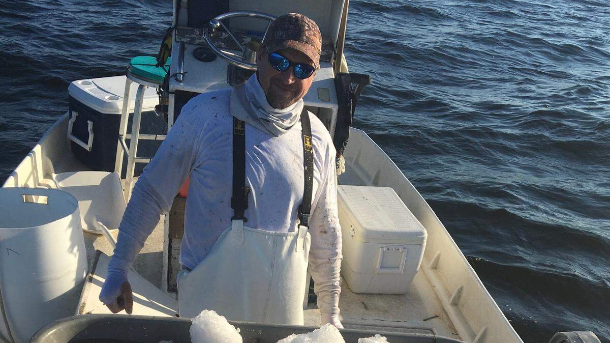 Commercial fisherman Tony Keehbauch shows off a recent day’s catch.