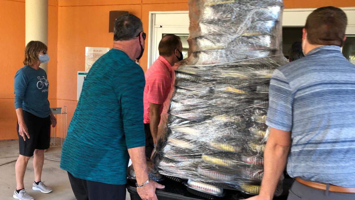 12/29/2020--Esplanade residents delivered 920 box lunches to Lakewood Ranch Medial Center on Tuesday. The box lunches were a gift from residents of Esplanade Golf and Country Club in Lakewood Ranch.