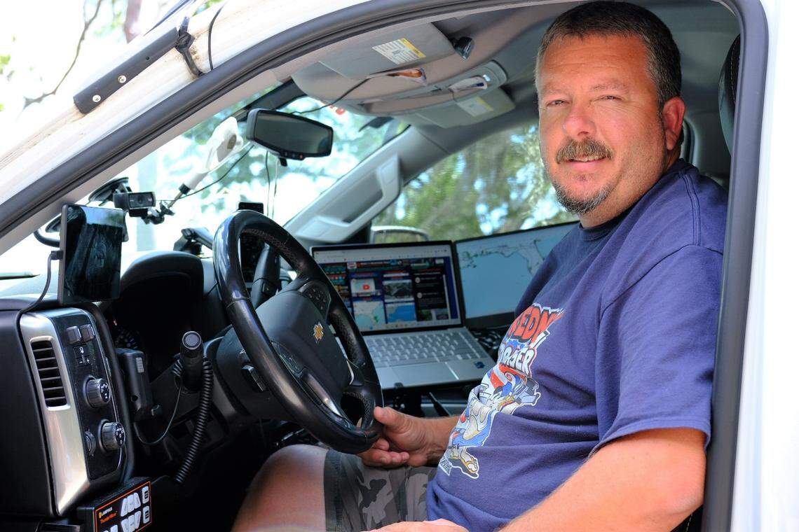 Mike Boylan of Mike’s Weather Page sits in his storm chasing truck on June 8, 2023. Boylan is prepping for tracking and chasing storms this hurricane season.