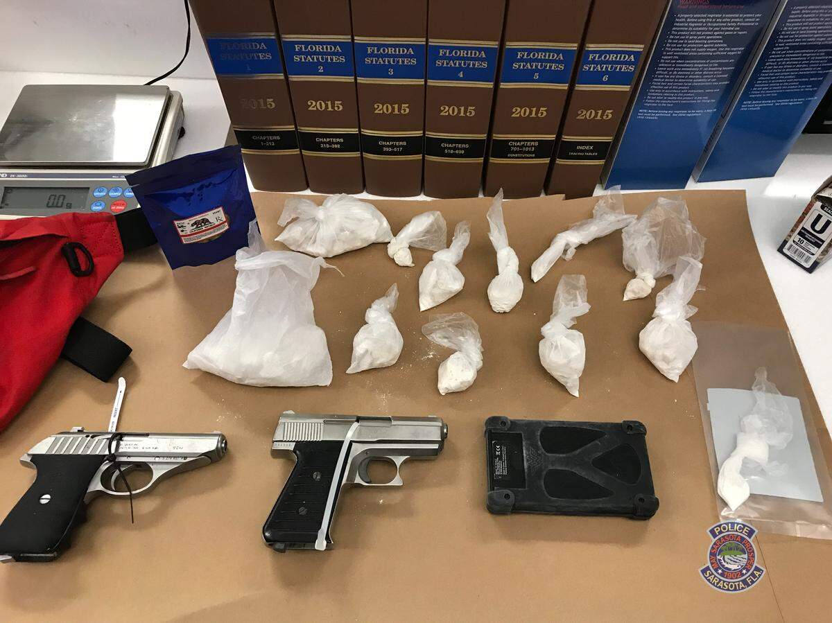 Sarasota police officers searched Brown and the vehicle and reported finding more than $2,000 in his pocket, two loaded 9 mm handguns, 397 grams of MDMA, 2 grams of cocaine, marijuana and a digital scale.