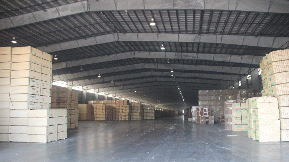 Flatbed trucks haul tons of imported lumber from ships to a warehouse at Port Manatee. Other important deliveries at Port Manatee include fuel, fruit, and raw materials, such as aluminum.