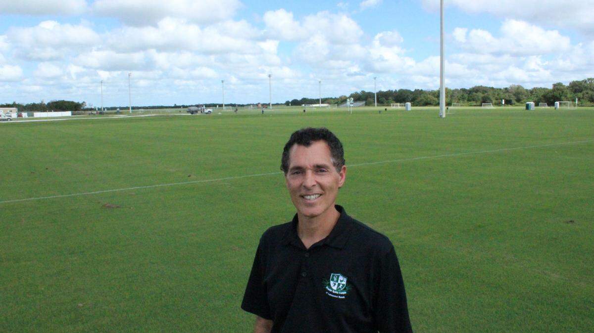 Antonio Saviano, director of sports for Premier Sports Campus, stands in the middle of a field where stadium seating is coming to Lakewood Ranch. 
 JAMES A. JONES JR./Bradenton Herald