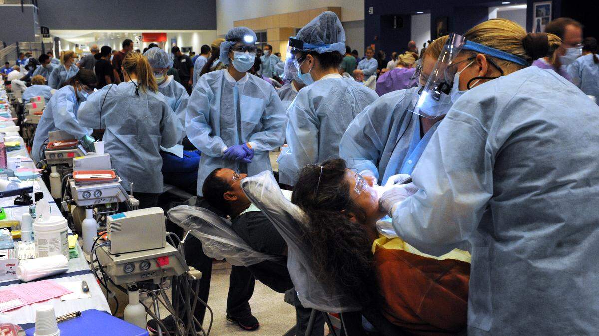 People receive dental care at the Remote Area Medical event in November at the Manatee Technical College, where free medical, dental and vision services were offered during the two-day event.File Photo GRANT JEFFERIES/Bradenton Herald