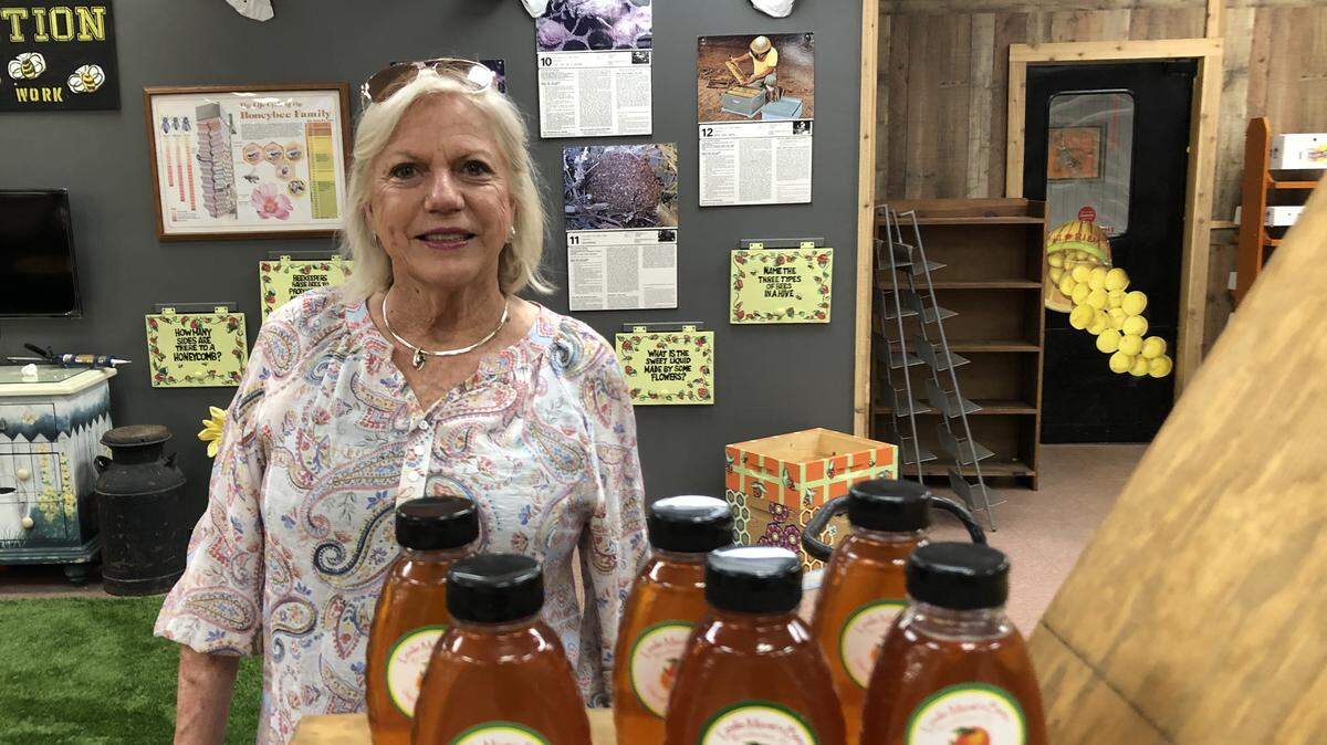 Mixon Fruit Farms, 2525 27th St. E., Bradenton, reopens on June 6, after being closed for two months because of the COVID-19 pandemic. Janet Mixon is shown above in the new bee exhibit.