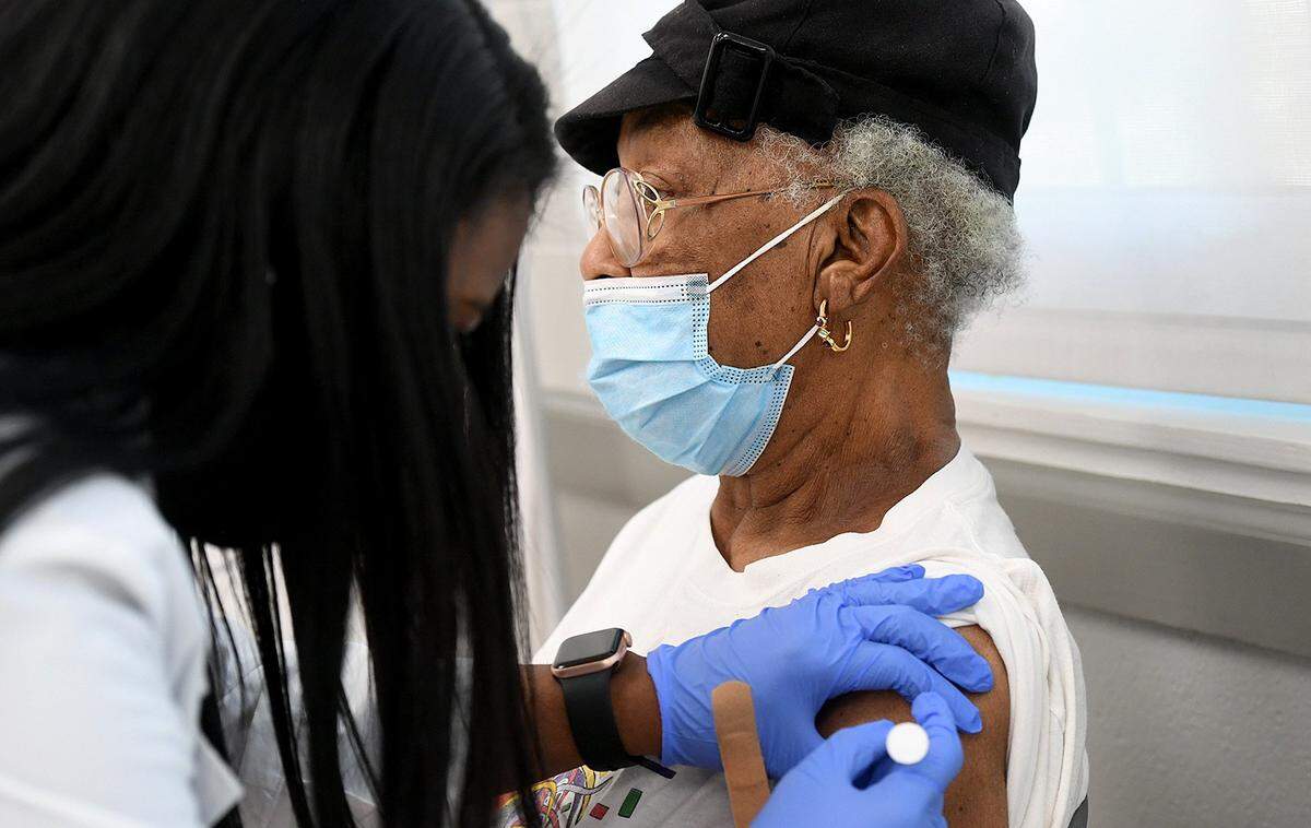 02/10/21--The Boys & Girls Clubs of Manatee County are hosting free COVID-19 vaccine clinics this week in Bradenton and Palmetto. Shown above in this file photo, Irene Brandon, 83, receives a vaccine during a February clinic in Rubonia.