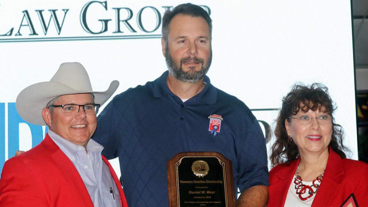 01/6/2022-Dan West received an emeritus award for his service as fair manager from 2003 to 2019. He is shown with Danny Alfonso and Diana Baker.