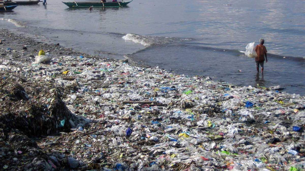 A September 2008 photo released by the Ocean Conservancy shows a trash-covered beach in Manilla, Philippines.
