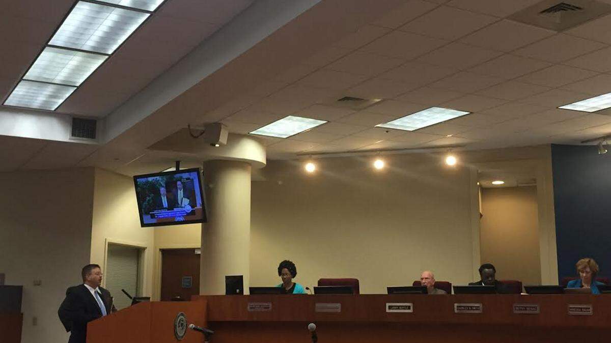 Bill Clague, assistant county attorney, talks about Long Bar Pointe settlement agreement during Thursday's county commission meeting. 
 CLAIRE ARONSON / caronson@bradenton.com