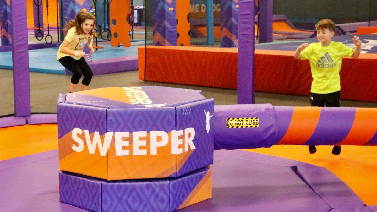 Children jump over the “sweeper” at Altitude Trampoline Park, 201 Cortez Road W., Bradenton. The attraction is inviting the public to a grand opening party 1-4 p.m. Friday, Nov. 25.