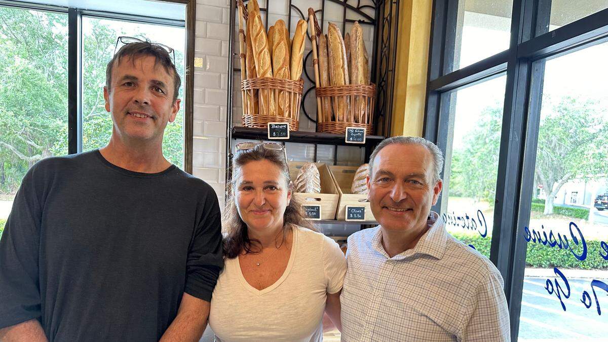 C’est La Vie Lakewood Ranch,  9118 Town Center Parkway, offers sit down dining, catering and fine cuisine to go. Manager Greg Desvenain and restaurant owners Geraldine Coutelle and Christophe Coutelle pose for a photo on May 8, 2024.