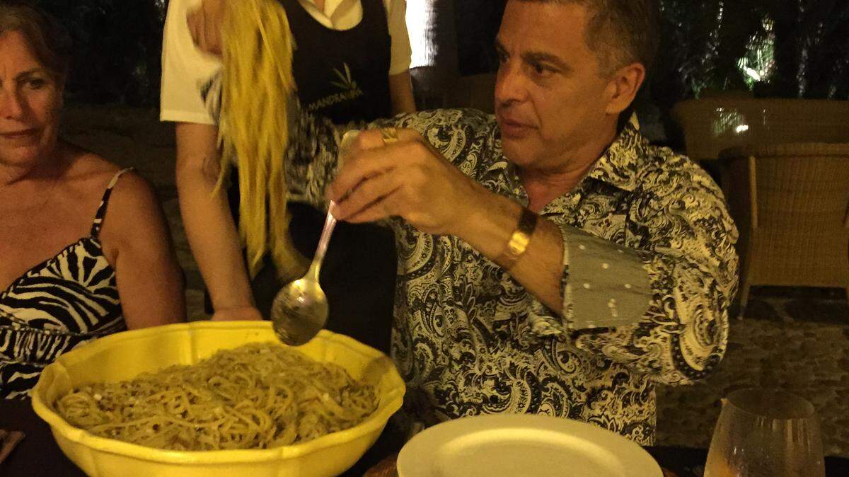 Chef Guy Cannata dishing out a helping of Pasta cu Muddica on his vacation to Sicily. 
 PHOTO PROVIDED