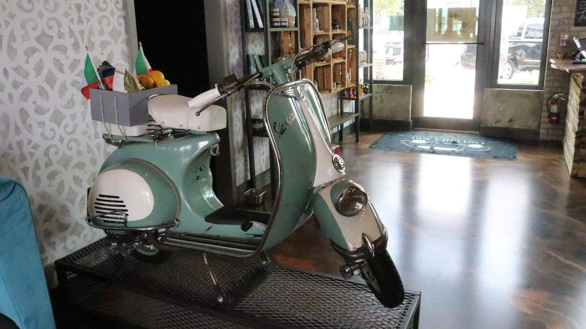 Osteria 500, a new Italian restaurant, opens Sunday, July 30, in Lakewood Ranch’s Waterside Place at 1580 Lakefront Drive. Shown above is a Vespa scooter in the front foyer.