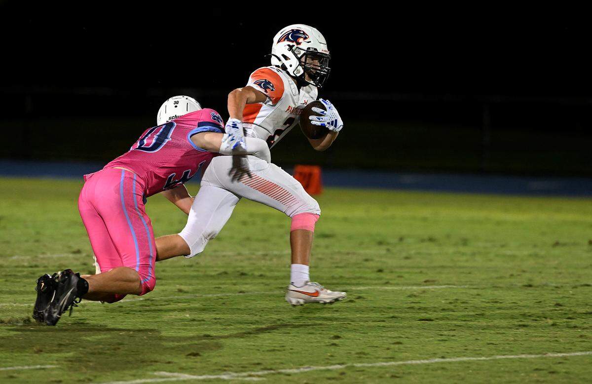 Bradenton Christian’s Colton Dempsey runs the ball at the Out of Door Academy field on Friday, Oct. 20, 2023.