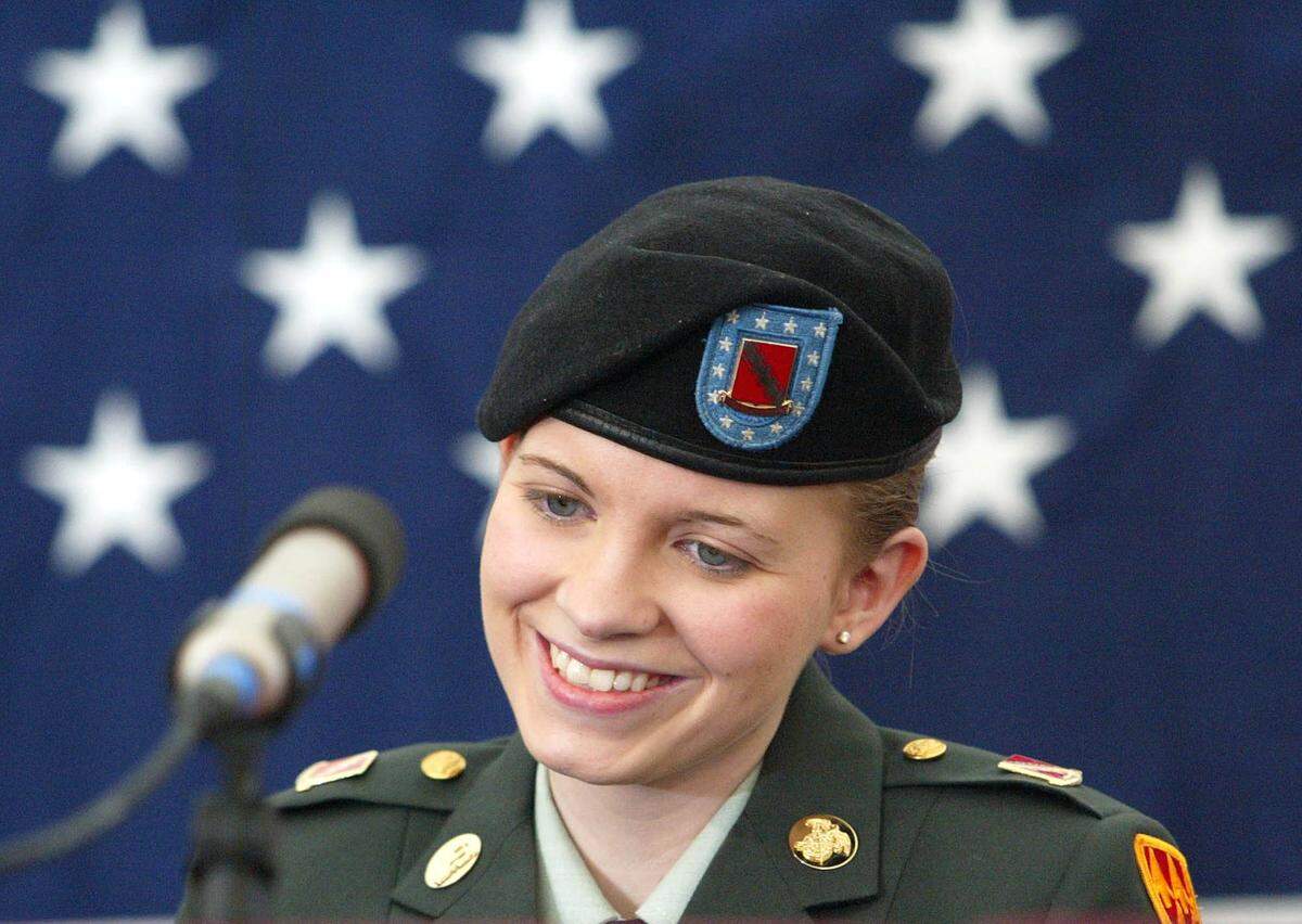Jessica Lynch makes remarks in 2003 from a wheelchair in the Elizabeth, W. Va., during her first public words since her ordeal. The former POW who joined the Army to earn money for college while seeing the world, plans pursue her dream of becoming a kindergarten teacher this fall. (AP Photo/Rick Bowmer)