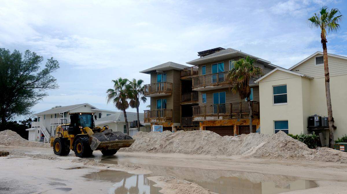 Anna Maria Island suffered extreme damages from the effects of Hurricane Helene, including massive amounts of sand in the roads and homes.