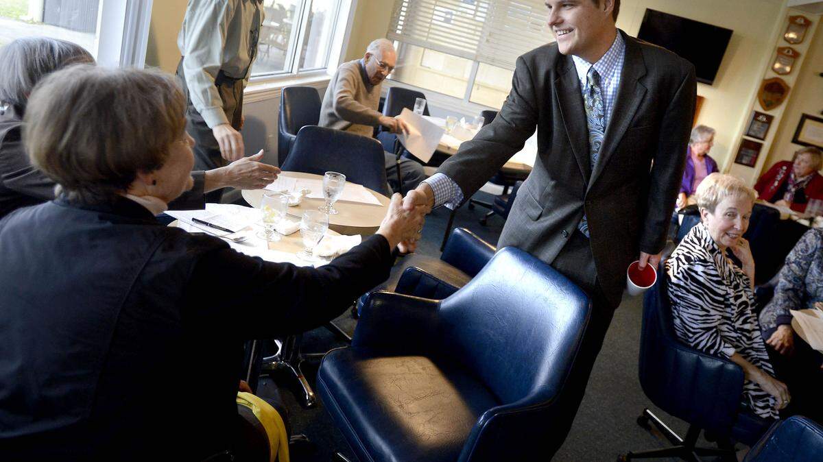 State Rep. Matt Gaetz shakes hands following a luncheon with the League of Women Voters of Okaloosa County on Tuesday, Jan. 8, 2013 at the Fort Walton Yacht Club in Fort Walton Beach, Fla. (AP Photo/Northwest Florida Daily News, Nick Tomecek)