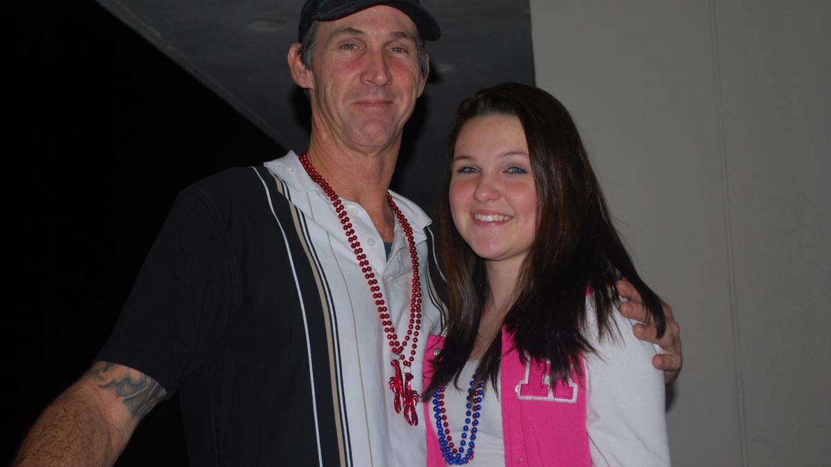 Hailey Simpson, 15, poses with her father, Larry Simpson, who died of a heroin and fentanyl overdose on Dec. 11, 2014. Provided photo