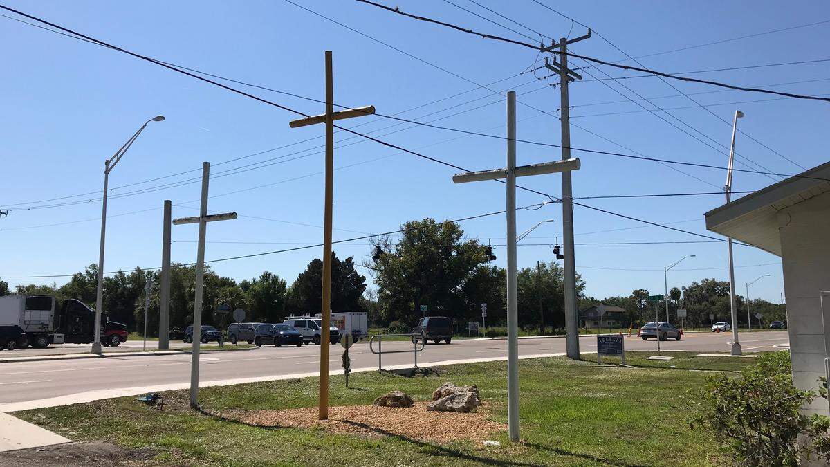 Easter crosses stand in front of church offices for the Parrish United Methodist Church and near the dangerous intersection of U.S. 301 and C.R. 675.