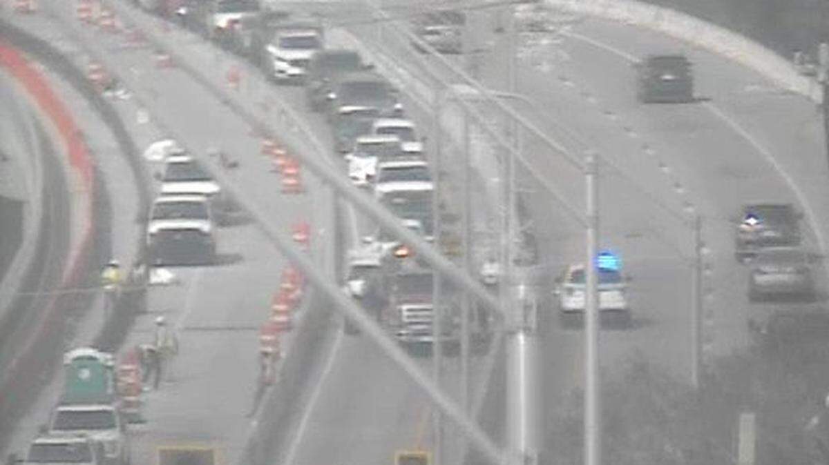 A crashed temporarily closed two lanes of the Green Bridge Monday afternoon.