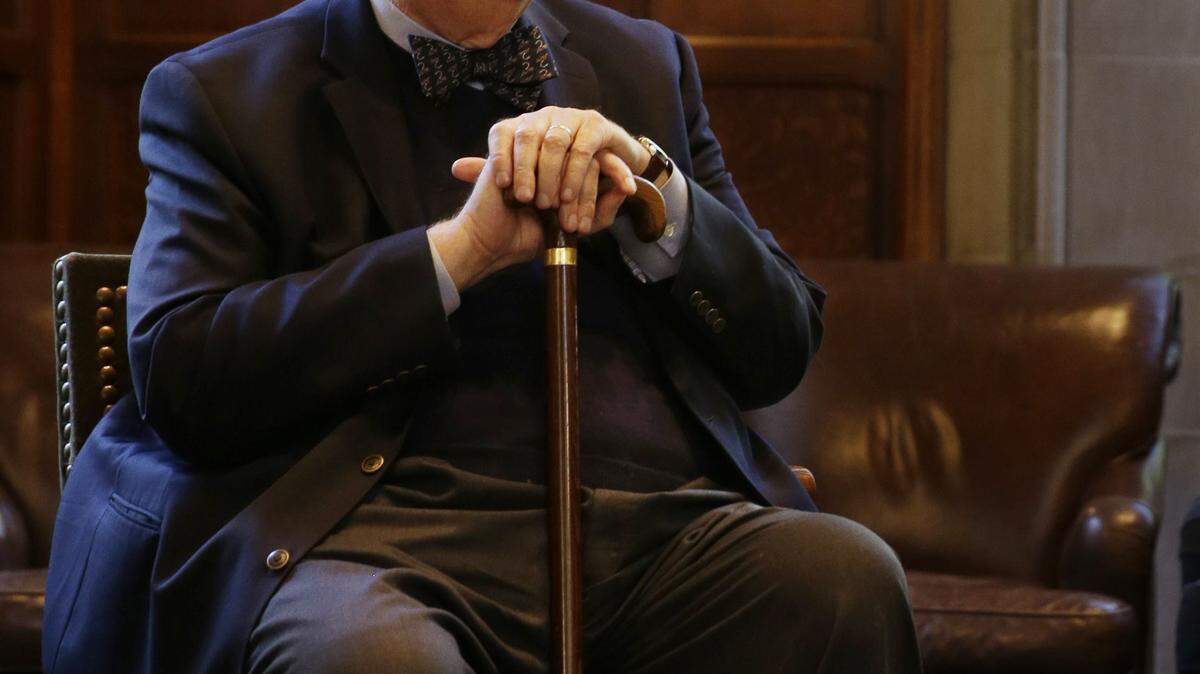Angus Deaton sits at a gathering in his honor at Princeton University after it was announced that he won the Nobel prize in economics, Monday, Oct. 12, 2015, in Princeton, N.J. Deaton, 69, won the 8 million Swedish kronor (about $975,000) prize from the Royal Swedish Academy of Sciences for improving understanding of poverty and how people in poor countries respond to changes in economic policy. (AP Photo/Mel Evans)