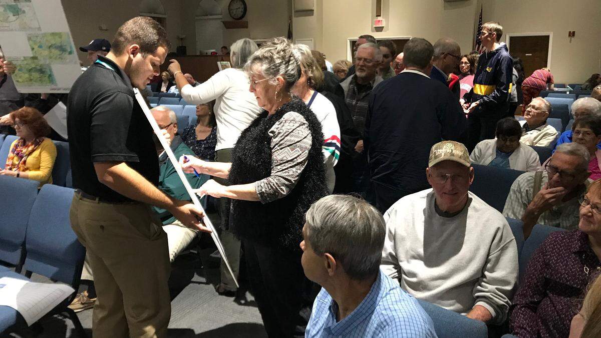 Residents vote for priorities they would like to see incorporated in the Parrish village neighborhood action plan. Parrish United Methodist Church recently hosted the visioning session.